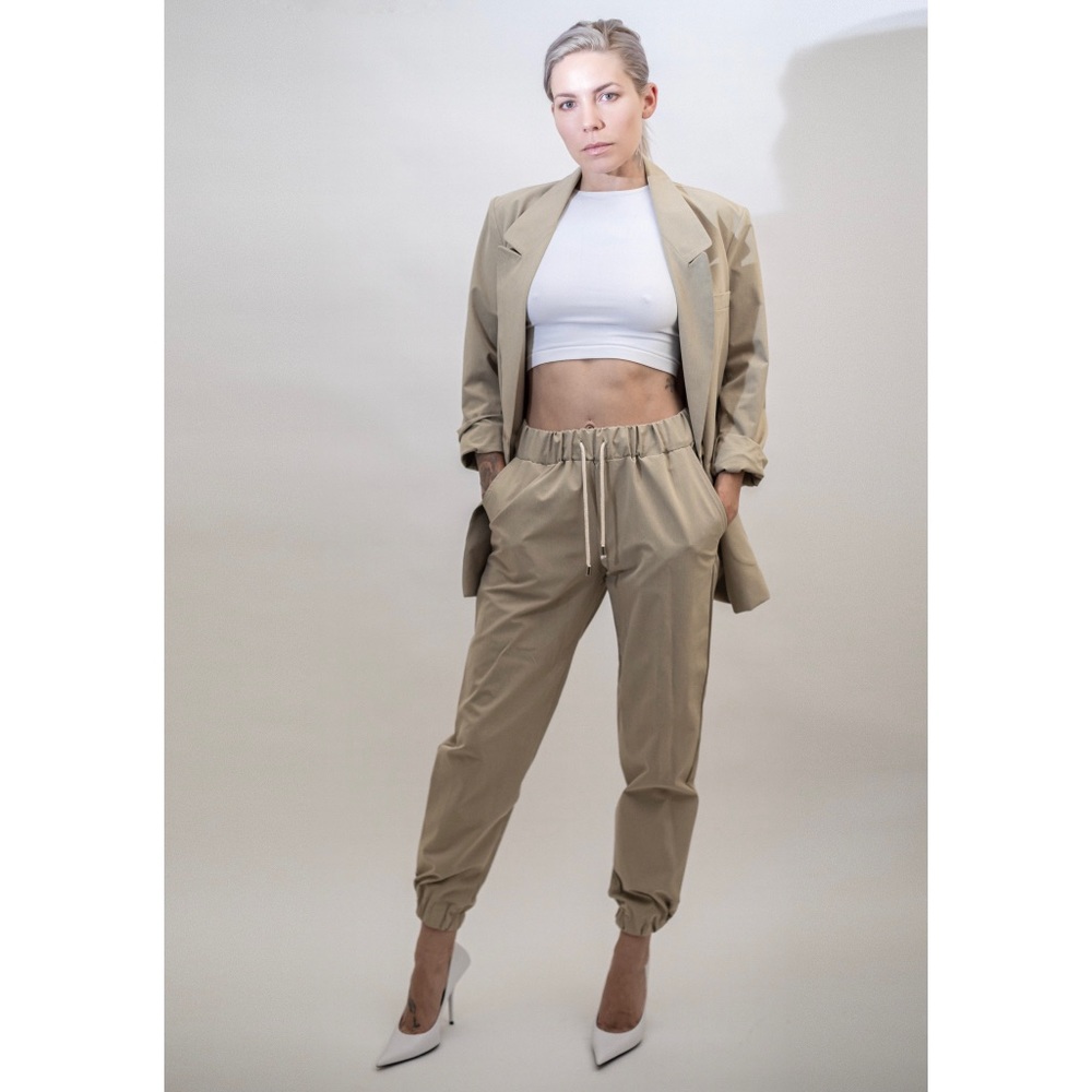 The Wave beige track pants